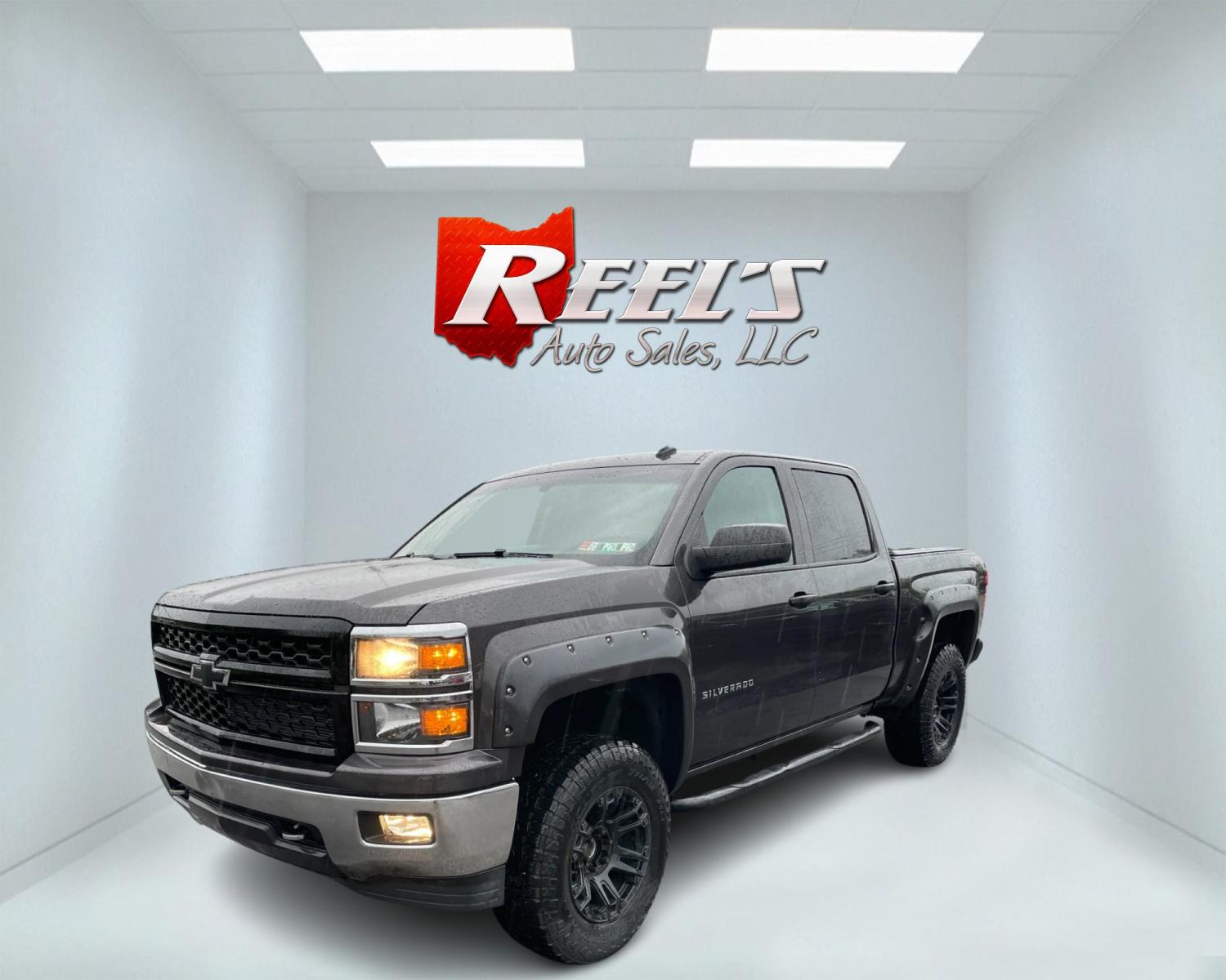 2014 Gray /Black Chevrolet Silverado 1500 LT Crew Cab 4WD (3GCUKREC7EG) with an 5.3L V8 OHV 16V engine, 6-Speed Automatic transmission, located at 11115 Chardon Rd. , Chardon, OH, 44024, (440) 214-9705, 41.580246, -81.241943 - This 2014 Chevrolet Silverado 1500 LT Crew Cab is a capable and well-equipped pickup truck. It's powered by a 5.3L Vortec V8 engine mated to a 6-speed automatic transmission with 3.42 gearing, delivering a robust 9,100-pound towing capacity. This particular model is lifted and rides on 33-inch all-t - Photo #0